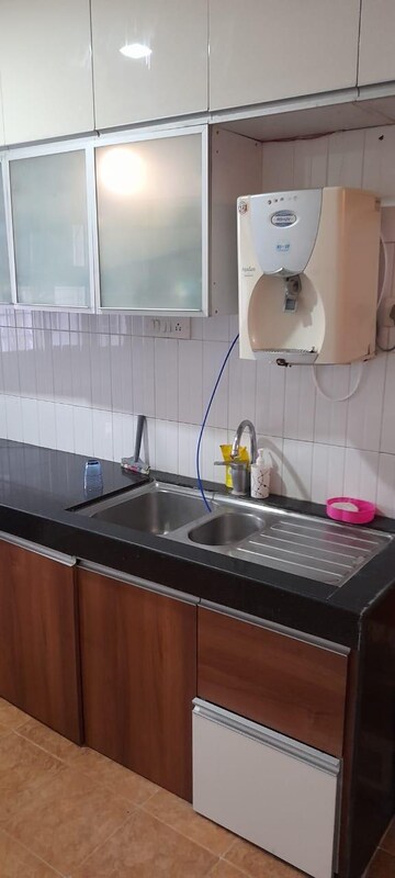 Kitchen in 4 BHK Apartment at Gera GreensVille SkyVillas, Kharadi – for Rent