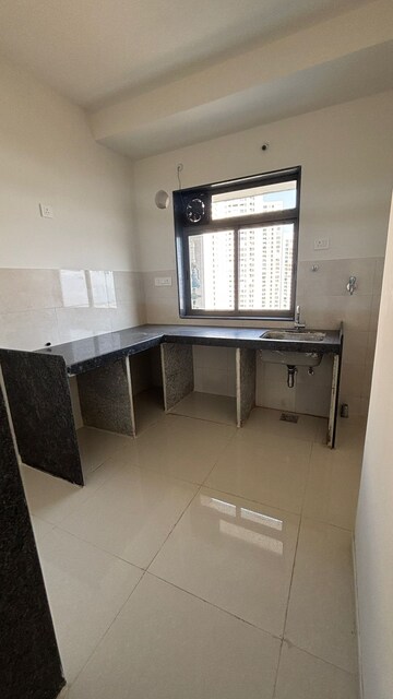 Kitchen in 1 BHK Apartment at Runwal Eirene Phase 2, Balkum Pada – for Sale
