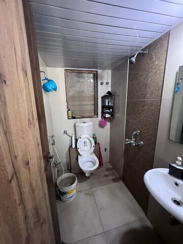 Bathroom in 2 BHK Apartment at Mohan Suburbia, Ambernath West – for Rent