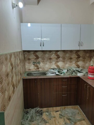 Kitchen in 2 BHK Apartment at Amrapali Golf Homes, Sector 4, Greater Noida – for Rent