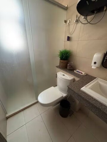 Bathroom in 3 BHK Apartment at Puri Anand Villas Phase II, Sector 81 – for Rent