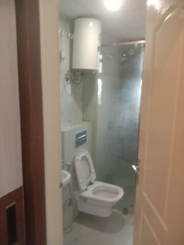 Bathroom in 3 BHK Apartment at Omaxe The Palace, Gomti Nagar – for Rent
