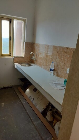 Kitchen in 1 RK Apartment at Chhatikara – for Sale