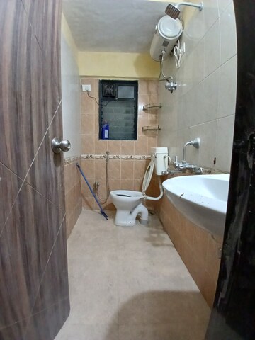 Bathroom in 2 BHK Apartment at Mantri Park, Goregaon East – for Rent