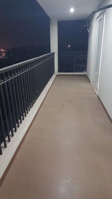 Balcony in 2 BHK Apartment at Paradigm Business Hermitage Park, Dhakoli Village – for Rent
