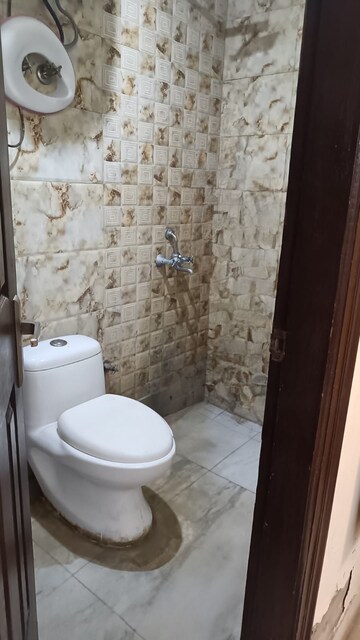 Bathroom in 3 BHK Apartment at Chattarpur – for Sale