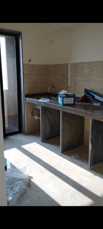 Kitchen in 1 BHK Apartment at Sunteck Maxxworld 2, Naigaon East – for Sale