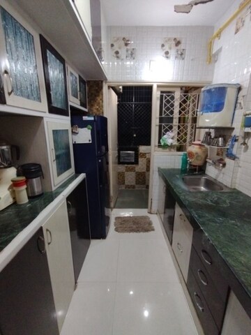 Kitchen in 2 BHK Apartment at Jivrajpark – for Sale