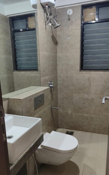 Bathroom in 2 BHK Apartment at Sunteck City Avenue 1, Goregaon West – for Rent
