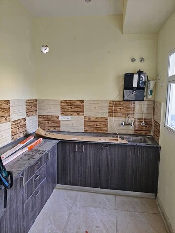 Kitchen in 2 BHK Apartment at Amrapali Terrace Homes, Tech Zone 4 Greater Noida – for Sale