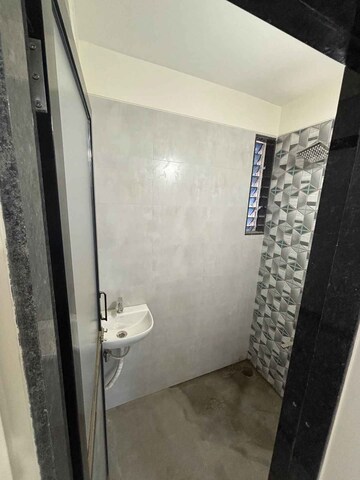 Bathroom in 1 BHK Apartment at Navkar City Phase II, Naigaon East – for Rent