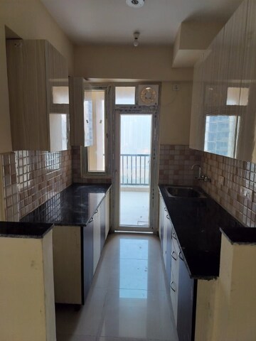 Kitchen in 3 BHK Apartment at La Residentia, Tech Zone 4 Greater Noida – for Rent