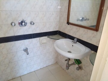 Bathroom in 1 BHK Apartment at Tata Symphony, Chandivali – for Rent