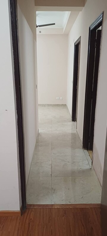 Building Lobby in 2 BHK Apartment at Amrapali Golf Homes, Sector 4, Greater Noida – for Sale