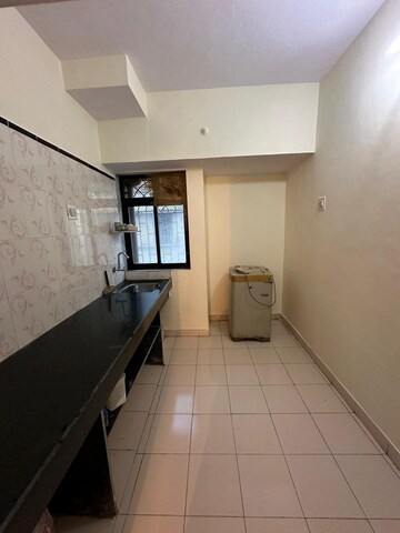 Kitchen in 1 BHK Apartment at Aashirwad CHS, Ghansoli – for Sale