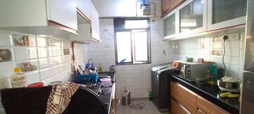 Kitchen in 2 BHK Apartment at Riverdale Tower, Andheri East – for Rent