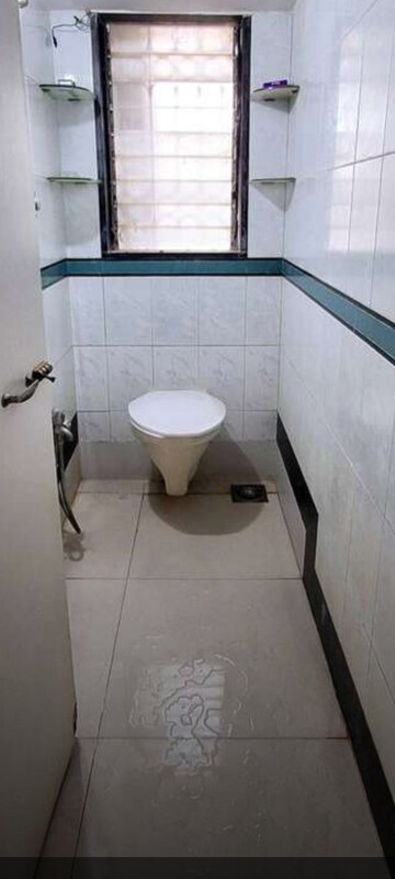 Bathroom in 2 BHK Apartment at Amrut Meraki, Shivaji Park – for Rent