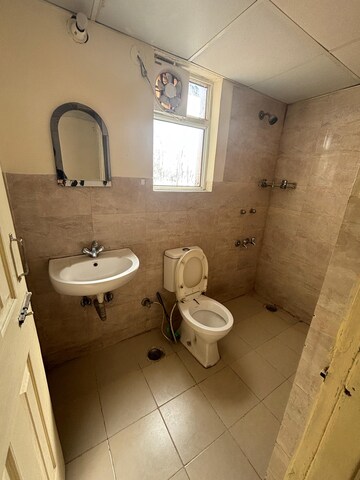 Bathroom in 2 BHK Apartment at Wave Dream Homes, Wave City – for Rent