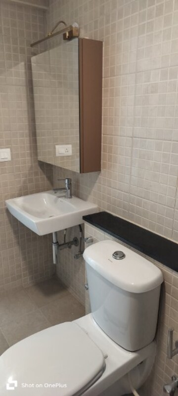 Bathroom in 2 BHK Apartment at Brigade Orchards Juniper, Devanahalli – for Rent