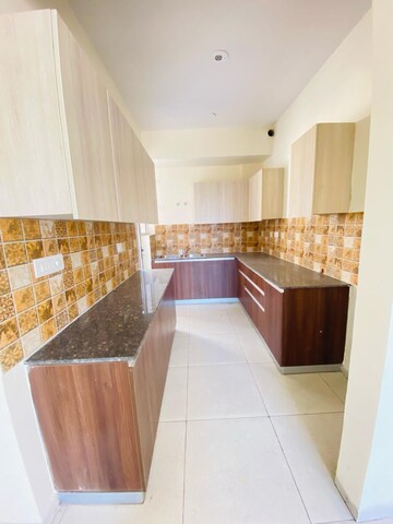 Kitchen in 3 BHK Apartment at Sushma Chandigarh Grande, Ghazipur – for Rent