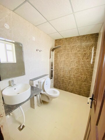 Bathroom in 3 BHK Apartment at Sushma Chandigarh Grande, Ghazipur – for Rent
