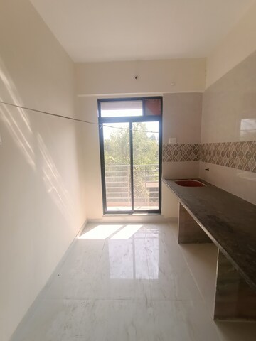 Kitchen in 2 BHK Apartment at Shree Morivali Richmand Park, Ambernath East – for Rent