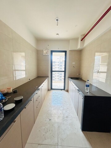 Kitchen in 1 BHK Apartment at Godrej City, Poyanje – for Sale