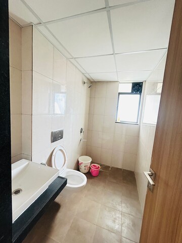 Bathroom in 1 BHK Apartment at Godrej City, Poyanje – for Sale