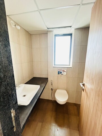 Bathroom in 1 BHK Apartment at Godrej City, Poyanje – for Sale