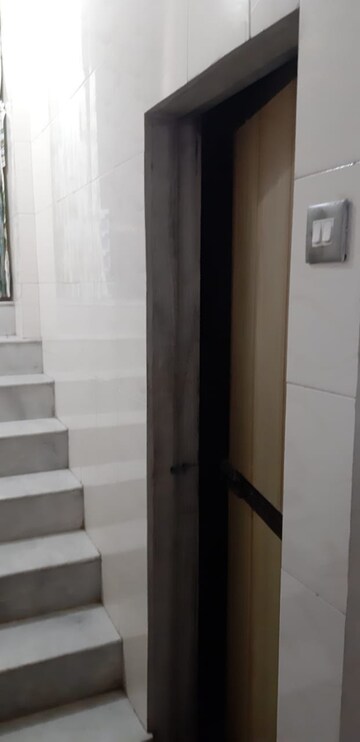 Staircase in 2 BHK Apartment at Seawoods West – for Sale