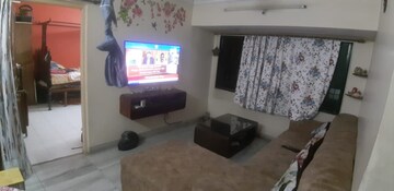 Living Room in 2 BHK Apartment at Seawoods West – for Sale
