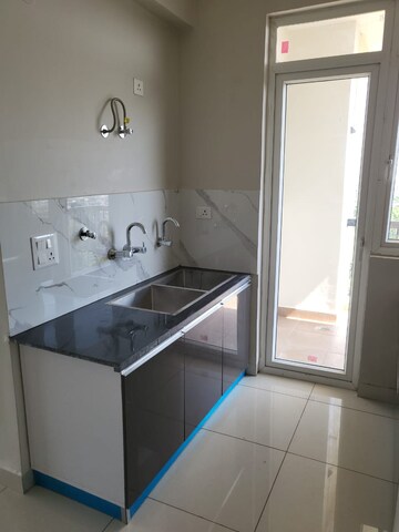 Kitchen in 2 BHK Apartment at SBP Gateway Of Dreams, Dhakoli Village – for Rent