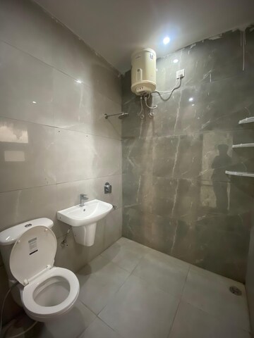 Bathroom in 2 BHK Apartment at Sunny Enclave – for Rent