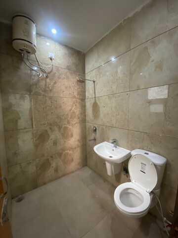 Bathroom in 2 BHK Apartment at Sunny Enclave – for Rent