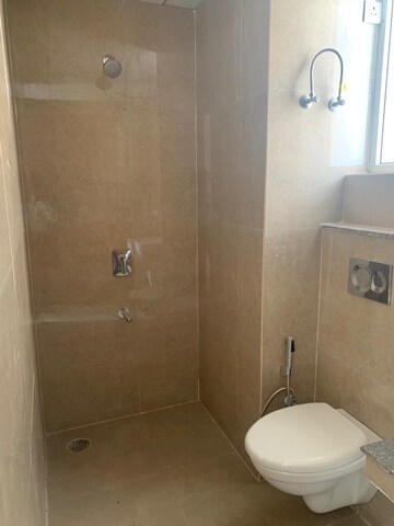 Bathroom in 3 BHK Apartment at Affinity Greens, International Airport Road – for Rent