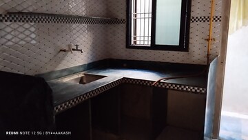 Kitchen in 1.5 BHK Villa at Kim – for Sale