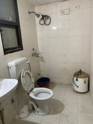 Bathroom in 2 BHK Apartment at Adore Happy Homes, Sector 86 – for Rent