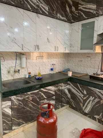 Kitchen in 2 BHK Apartment at Adore Happy Homes, Sector 86 – for Rent