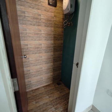 Bathroom in 1 BHK Apartment at Lodha Quality Home Tower 2, Saket Complex – for Sale
