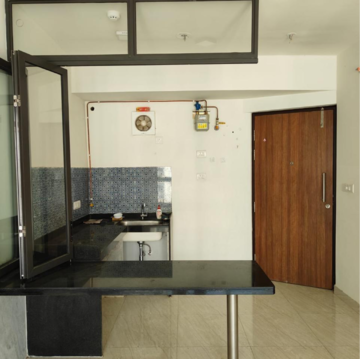 Kitchen in 1 BHK Apartment at Lodha Quality Home Tower 2, Saket Complex – for Sale