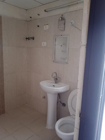 Bathroom in 3 BHK Apartment at Antriksh Golf View, Sector 78 – for Rent
