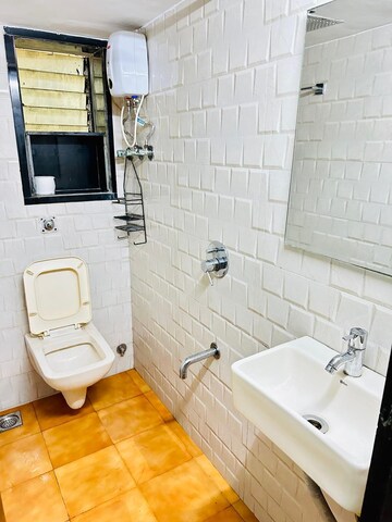 Bathroom in 1 BHK Apartment at Murli Govind, Khar West – for Rent