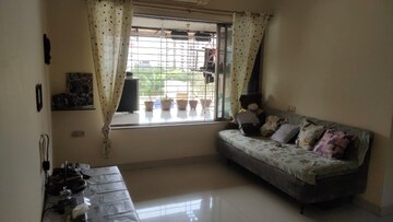 Living Room in 1 BHK Apartment at Goregaon West – for Sale