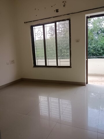 Room in 2 BHK Apartment at Zingabai Takli – for Sale