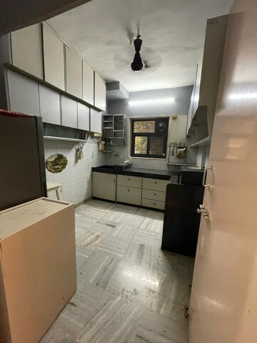 Kitchen in 2 BHK Apartment at Golden Pebbles CHS, Santacruz East – for Rent