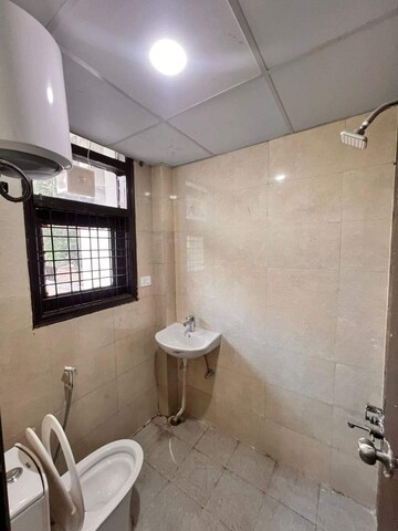 Bathroom in 3 BHK Builder Floor at Chattarpur – for Rent