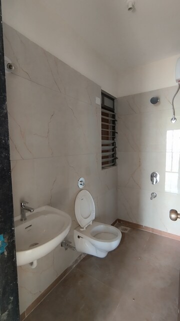 Bathroom in 1 BHK Apartment at Raunak City Sector 4, Kalyan West – for Rent