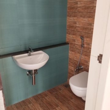 Bathroom in 1 BHK Apartment at Lodha Quality Home Tower 2, Saket Complex – for Sale