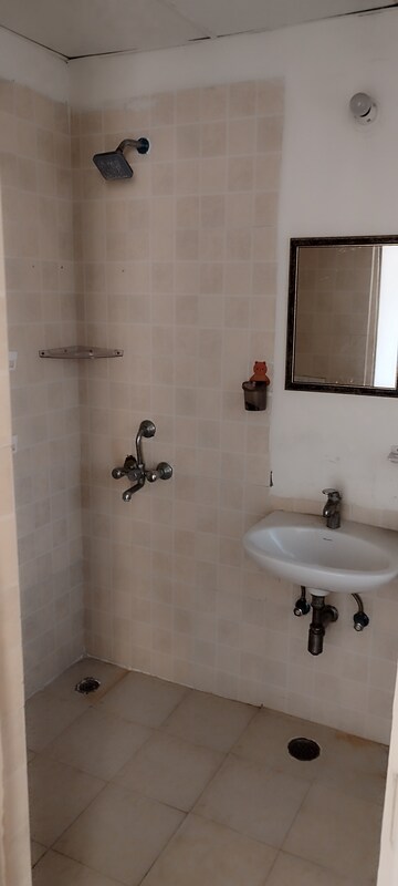 Bathroom in 3 BHK Apartment at Sikka Karnam Greens, Sector 143b – for Sale