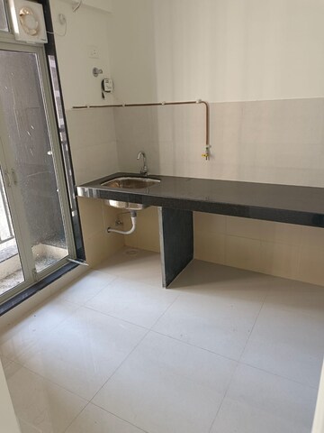 Kitchen in 2 BHK Apartment at Ashar Metro Towers, Vartak Nagar – for Rent